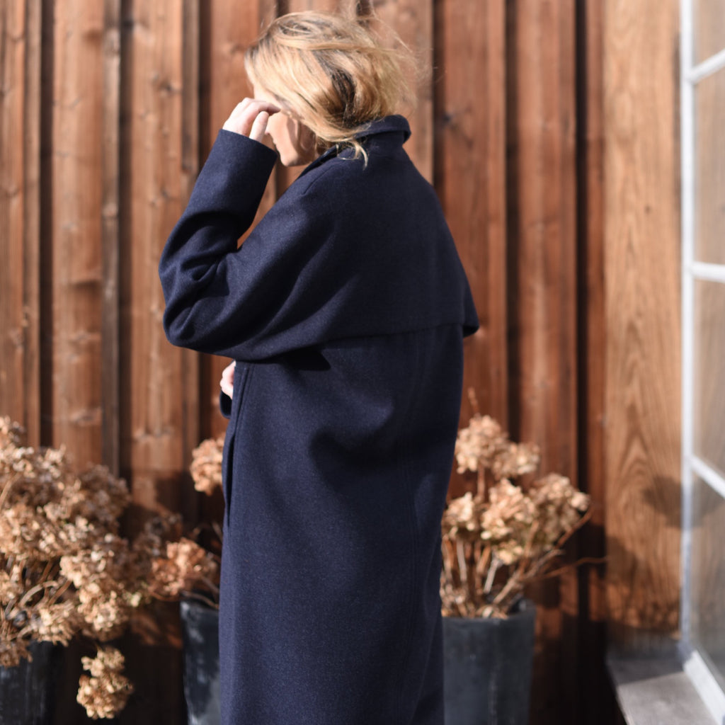 100% merino wool coat in dark blue, classic all time favourite coat. staple jacket. unisex coat. sustainable coat, produced locally. Free shipping. cruba