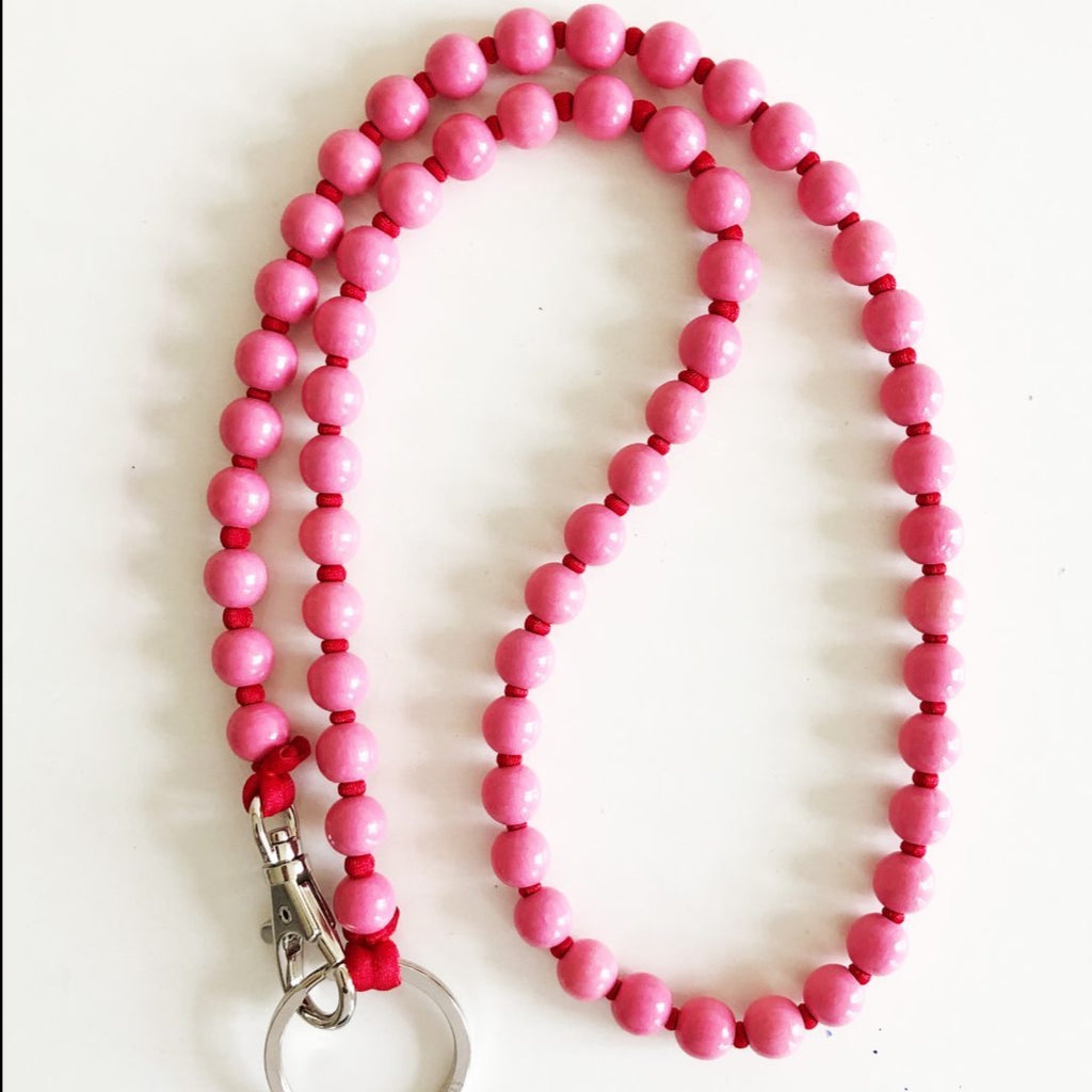 Ina Seifart beaded keychains, colourful beads and colourful elasticated ribbon, pink/red